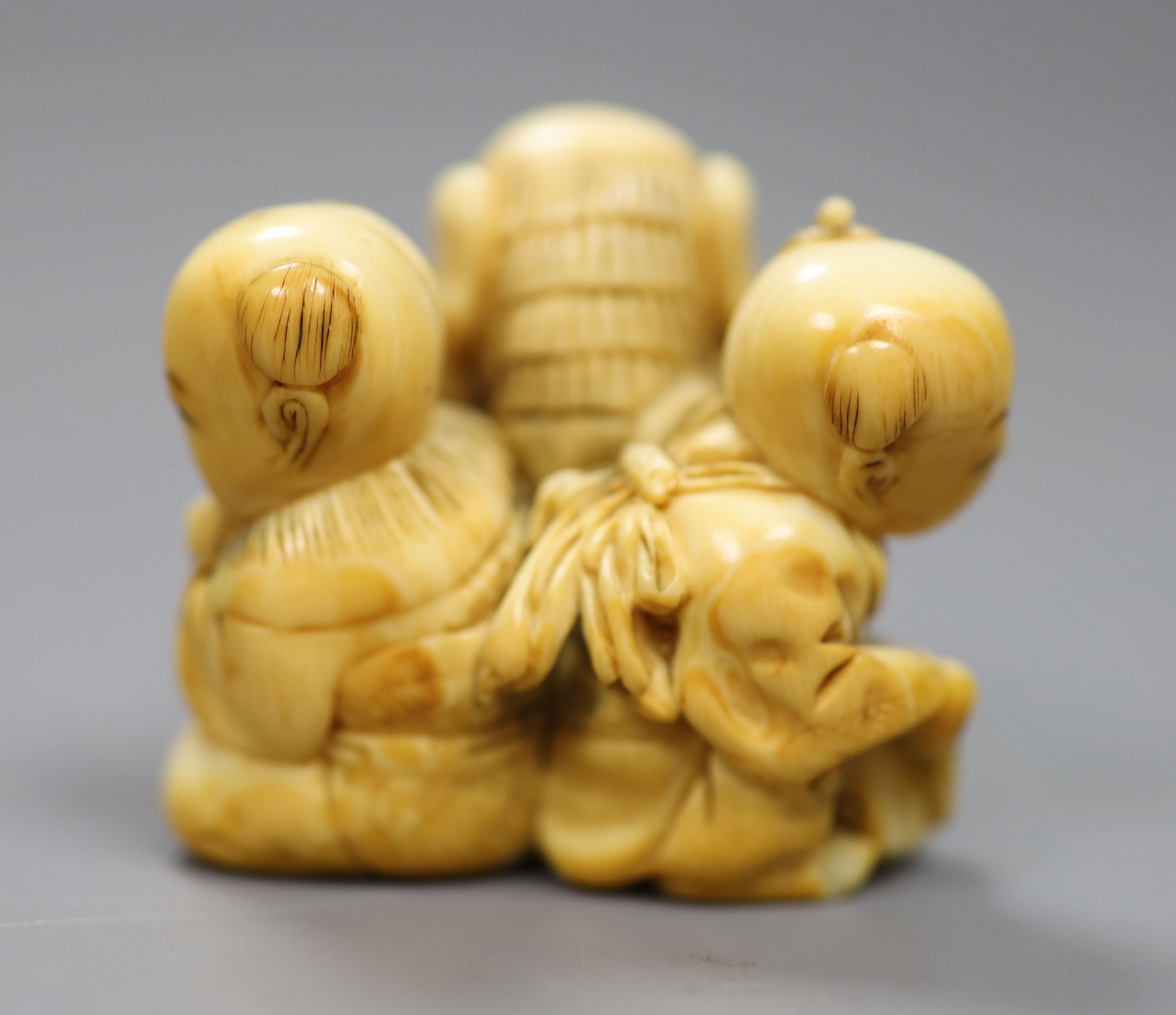 A 19th century Cantonese export carved ivory whist box, with a sliding floral panelled cover, and contents, 5 x 3.5cm together with a